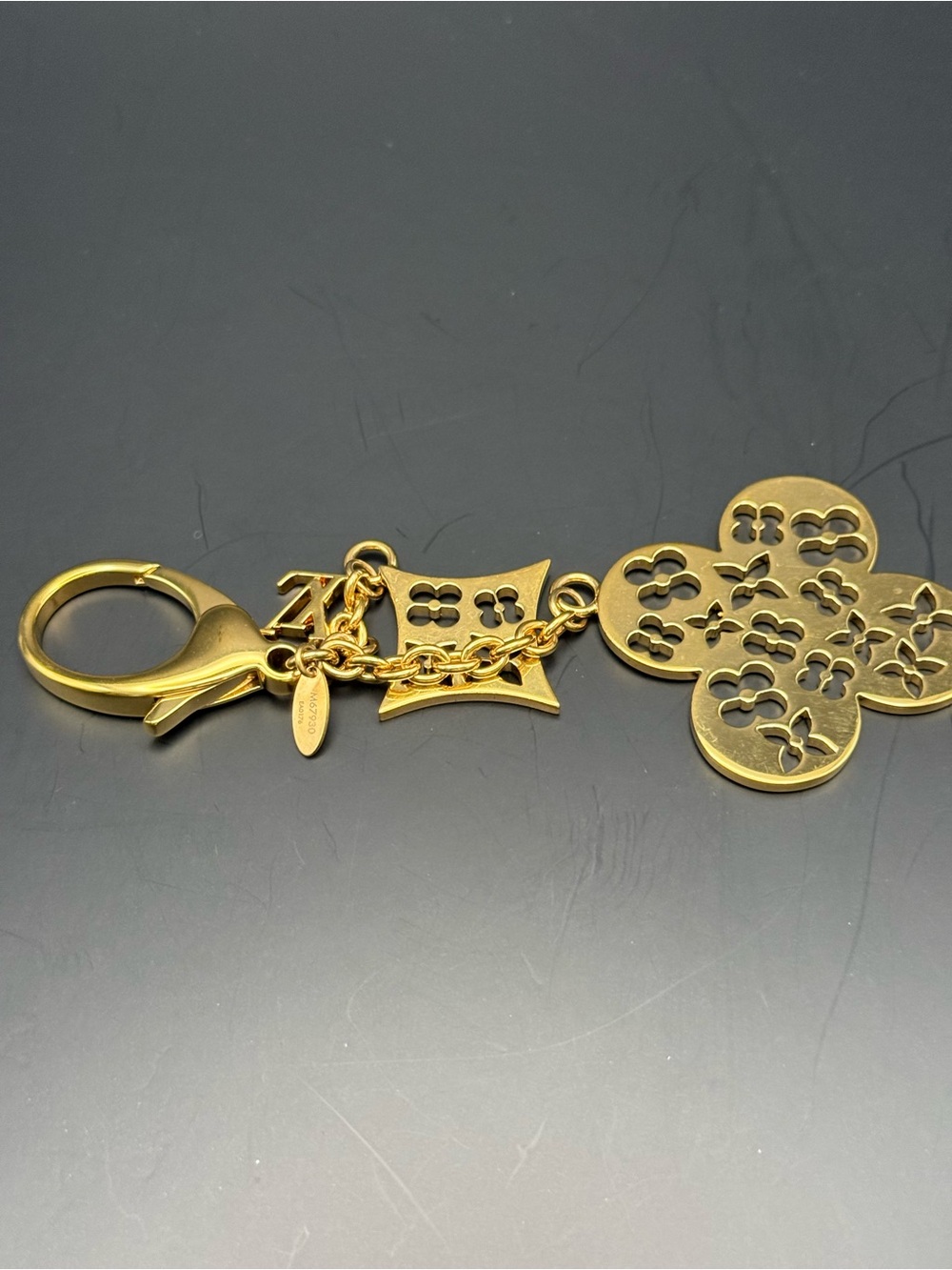Louis Vuitton Fleur de Monogram Bag Charm Shiny Gold Giftable condition box/DBag